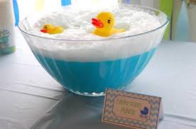 Baby bath punch recipe 2 bottles ginger ale 1 pint raspberry sherbet 1 package frozen raspberries 2 rubber duckies a fun way to add a little extra punch to your party, wouldn't you say? How To Throw A Make Way For Ducklings Party Brightly Baby Shower Punch Recipes Baby Shower Punch Baby Shower Duck
