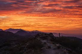 As the sun slips behind the purpling mountains surrounding the city, the skies above turn vibrant shades of red, orange, yellow, and pink. Rx10 Phoenix Sunset Sony Cyber Shot Talk Forum Digital Photography Review