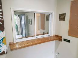 The window folds upward to an opening almost twice as large as a traditional double hung. Service Windows Pass Thru S Metal Craft Quality Sliding Doors Since 1946