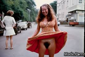 Porn image of 30 vintage upskirt street laughing 70s lift dress created by  AI