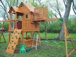 You'll find every kid's playground activity you can imagine. Sky Fort Swing Set Forts For Kids Outdoor Swing Set Backyard Fort