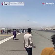 Disturbing images a us military plane took off from kabul airport with desperate locals still clinging to the aircraft. Yuq7impbphq8im