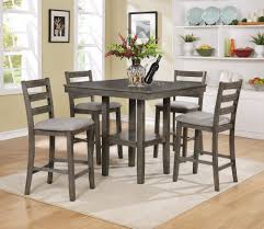 Counter height pub tables are usually 33 to 38 inches tall, while the chairs best suited for these tables are around 23 to 28 inches. Gray Pub Table 4 Chairs Cm 2630 Gy Gray T 4 Dining Room Groups Price Busters Furniture