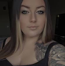 Who owns the truck with Christmas lights driving around Red Oak Iowa?