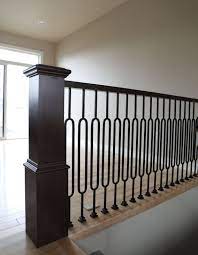 Interior Products Stair Systems Can Be A Great Way To Introduce Details And This Pre Finished Box Newel And Forged Iro Interior Window Toppers Iron Balusters