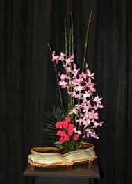Maybe you would like to learn more about one of these? Ikebana Sue Grier Pottery