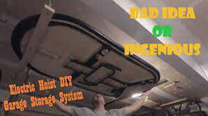 Motorized operation makes raising and lowering storage effortless. Garage Ceiling Storage Diy Electric Retractable Pulley System Youtube