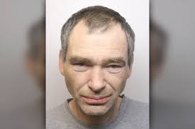 A robber who broke into a pensioner's home and punched her before taking  cash and jewellery has been jailed for eleven years. Thomas Kennedy  admitted robbing the 80-year-old at her flat in