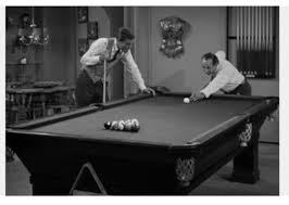 Slang someone who deceives and swindles others. Hustling The Hustler 1962