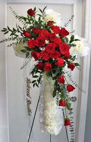 Before you send sympathy flowers to a bereaved family you should always consider funeral flower etiquette and there are many different types of flower that are appropriate for different funerals: Funeral Cross With Roses Carnations In Edison Nj E E Flowers