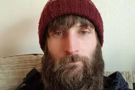 Man pointed rifle at housing official warning him 'you-now' after he was  ordered to leave flat