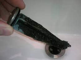 Sewer sludge, as it relates to your home's pipes, is a build up of any or all of the individual sources below What It Means When The Sink Drain Discharges Black Debris