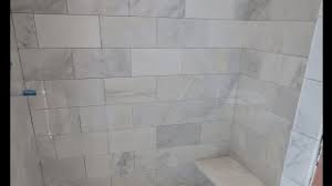 Marble master bathroom with three different sizes of carrera marble this is part 2 detailing the steps taken to installing the marble tile on the shower. Marble Carrara Tile Bathroom Part 3 Close Up Look Installing Carrera Marble Tile And Bench Seat Youtube