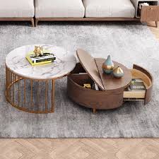 The lower table features rich textured walnut paper, while the smaller floating table boasts an elegant white carrara faux marble top. Modern White Walnut Round Coffee Table With Storage Wood Rotating Marble Nesting Coffee Table In Rose Gold Set Of 2
