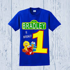 Your little one will look adorable at his first birthday party in this sesame street onesie with suspenders and bow tie! Sesame Street Birthday Shirt Sesame Street First Birthday Shirt Other Styles Avai Sesame Street Birthday Sesame Street Birthday Party First Birthday Shirts