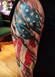 Very nice shoulder design, once again massive military influence. 9 Amazing Ripped Skin Tattoo Ideas Designs And Images Styles At Life