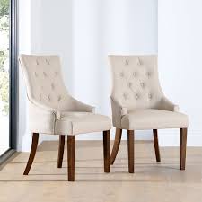 Featuring a neutral oak shade, this dining table will be able to fit a wide range of interior styles; Duke Oatmeal Fabric Button Back Dining Chair Dark Leg Furniture And Choice