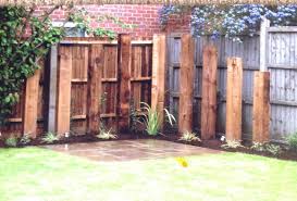 Upright Railway Sleepers Introduce Height And Define The Edge Of The Terrace While Planting Softens The Ha Sleepers In Garden Country Garden Decor Front Garden