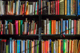 Also those books i borrow from libraries, enjoy, but then forget about. Books In Black Wooden Book Shelf Free Stock Photo
