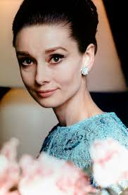 Her sides have been cut short and jagged and her top has been angle layered to create a piecey effect. Audrey Hepburn Hair Her 9 Most Iconic Hairstyles Marie Claire Australia