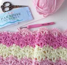 May 07, 2019 · if you want to crochet a blanket that won't be excessively warm, this granny square pattern is a great one to have in your pattern stash. Lacy Shells Crochet Baby Blanket Annie Design Crochet