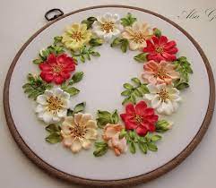This ribbon embroidery tutorial is suited for both beginners and experts. Hand Embroidery Designs Ribbon Embroidery Hoop Art Wild Roses And Pansy Silk Ribbon Embroidery Patterns Hand Embroidery Designs Silk Ribbon Embroidery