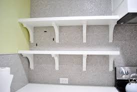 broken tile & reducing shelf brackets