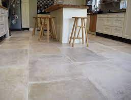 Stone effect laminate flooring is not only amazing for kitchens and bathrooms but also looks great in bedrooms and living rooms. Stone Effect Beige Porcelain Tiles Antique Effect Stone Superstore Porcelain Tile Floor Kitchen Beige Tile Kitchen Porcelain Floor Tiles