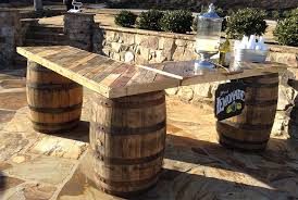 In diameter crafted of wood and metal wood barrel tabletop stained slatted wood look metal bars on. L Shaped Whiskey Barrel Table 4 Barrels W L Top Party Time Rents