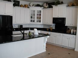white cabinets black appliances