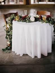 Dwight And Santara S Sweetheart Table Garland Sweetheart Table Wedding Wedding Inspiration Fall Romantic Wedding Flowers