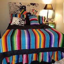 Turn Your Dorm Room Into Cowgirl Heaven With Serape Decor Cowgirl Bedroom Home Decor Mexican Bedroom