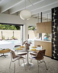 Pop Art Street Art And Space Age Furniture Collide At A Painter S Midcentury Ranch Home In Florida Saarinen Dining Table Metal Dining Chairs Plywood Chair