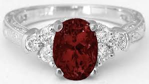This geometric design is unlike any other. Garnet Diamond Engraved Engagement Ring Gr 8063