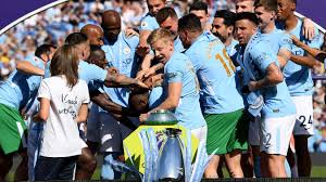 Soon, fans were setting off blue flares and parading small replica premier league trophies. Manchester City Lift Premier League Trophy