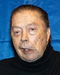 Please who was the con man in the wheelchair actor and caricature