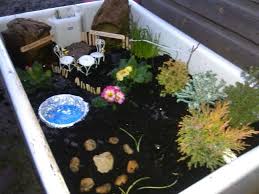 Children S Fairy Garden In Old Belfast Sink Fun Outdoor Small World Play In Early Years Belfast Sink Garden Fairy Garden Belfast Sink