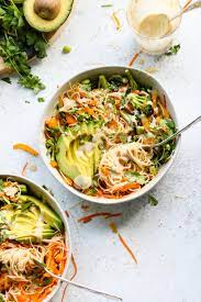 Rainbow Rice Noodle Bowls With Miso Tahini Dressing Flora Vino Recipe Vegetarian Noodle Bowls Vegetarian Noodles Noodle Bowls Recipes