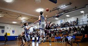 Faith Christian boys basketball team defeats top seed Phil-Mont