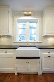 The above cabinet lighting helps to brighten up an already glowing kitchen. Under Cabinet Lighting Transitional Kitchen Scott Lyon Company