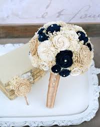 Just imagine how all these glitter details would sparkle in. This Custom Handmade Gold Navy Bridal Bouquet Features Sola Wood Mums Dyed In A Gorgeou Gold Wedding Bouquets Navy Blue And Gold Wedding Gold Wedding Flowers
