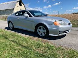 Image result for Pewter Silver 2003 Tiburon