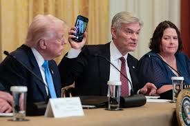 Dr. Oz presenting to an exhausted Trump