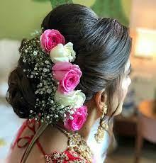 Pin By Preksha Pujara On Flower Bun Idea Loose Hairstyles Bridal Hair Indian Bridal Hairstyles