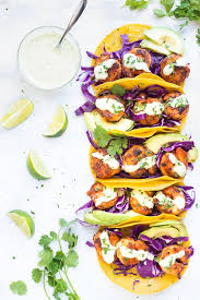 In a medium sized skillet over medium high heat add olive oil and shrimp. Spicy Shrimp Tacos With Cilantro Lime Sauce Evolving Table