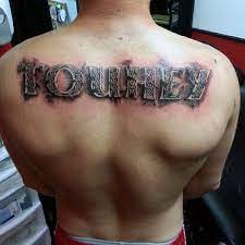 The name tattoo design below is a unique piece of art with colorful bold name tattoo fonts that makes the entire design to look amazing. 50 Last Name Tattoos For Men Honorable Ink Ideas