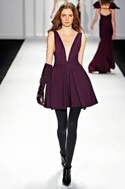 Fall Must Have Sky High Bootie We Love Pairing Tights And Ankle Boots With Voluminous Skirted Cocktail Dresses Fashion Tight Dresses Fashion Week