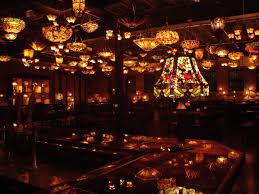 Nouveau Antique Art Bar Caters To Houston S Young Professionals Located In The Heart Of Midtown It Combines The Styl Tiffany Style Lamp Antique Art Chandelier