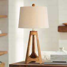 Wood or leather) with black or gold accents. Archie Mid Century Modern Wood Tripod Table Lamp 80r23 Lamps Plus