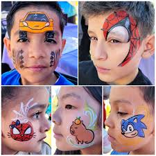 A mom pulled up this face paint google image of a race car with tread marks  running down...I tried my best to hide my terror. I was sweating it. Cars  are my